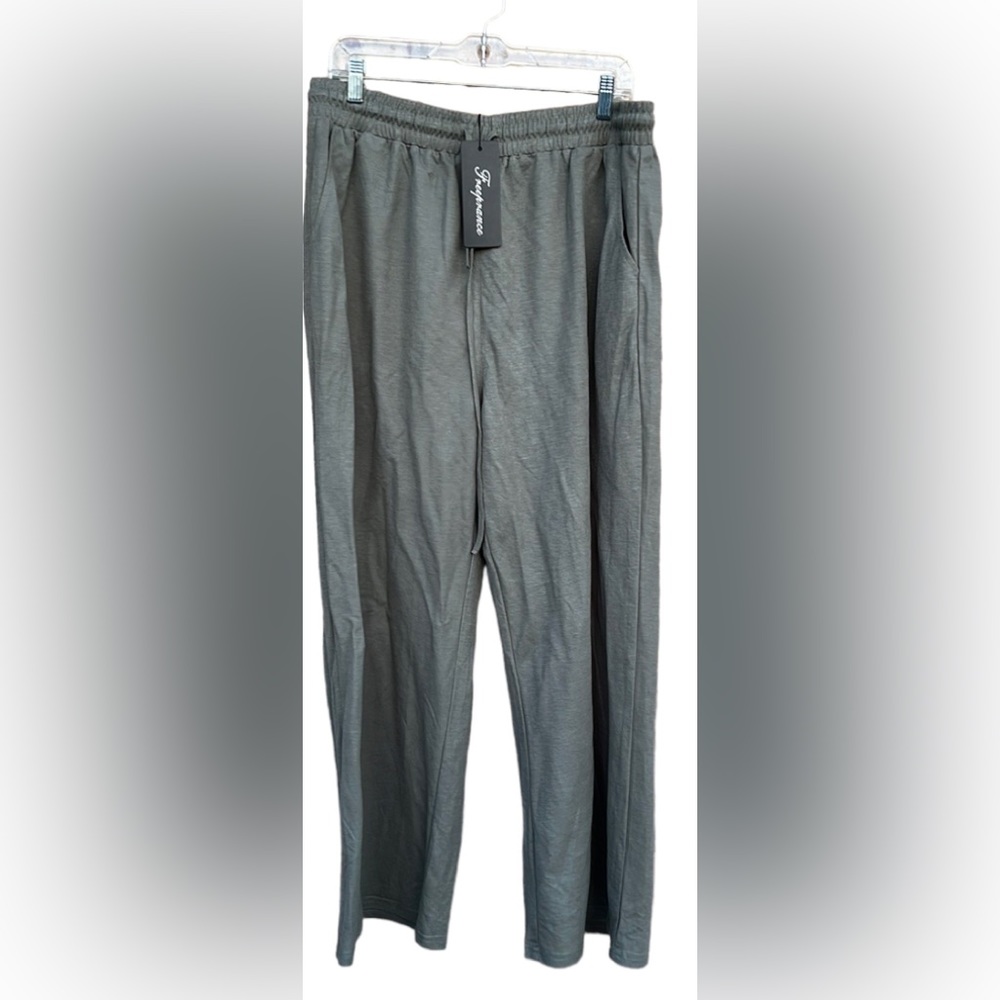 Free Prance wide legged comfy pants. Elastic waist with a draw string tie